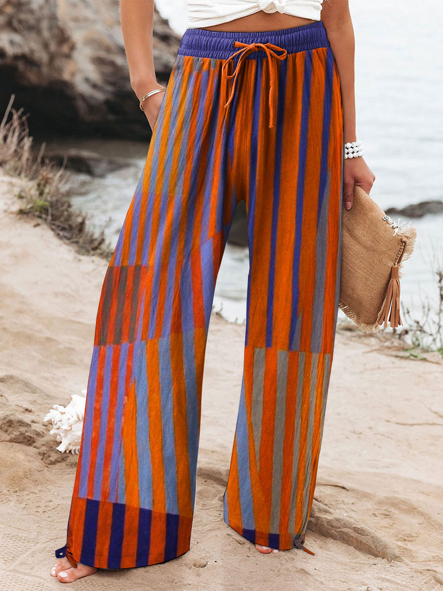 Women's Colorful Striped Wide Leg Pants – Relaxed Fit Lightweight Casual Statement Trousers  Description:  ADD A BOLD AND VIBRANT TOUCH TO YOUR STYLE WITH THESE